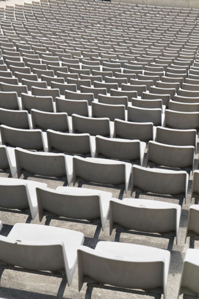 Empty chairs in stadium