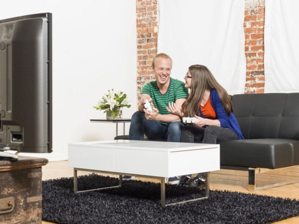 Couple playing video games together