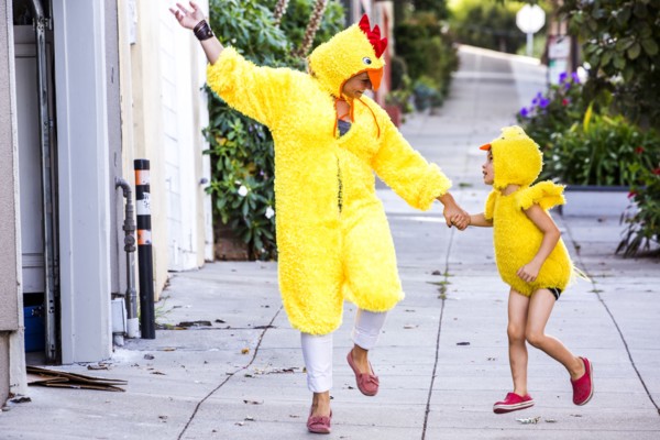 Mother and son wearing matching costumes