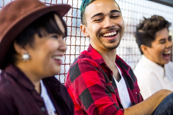 Friends laughing outdoors