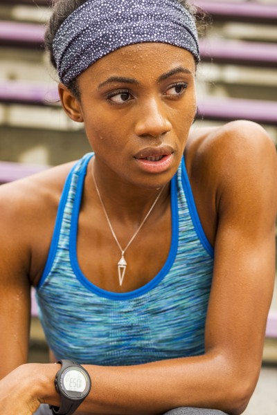 Serious Black athlete sweating
