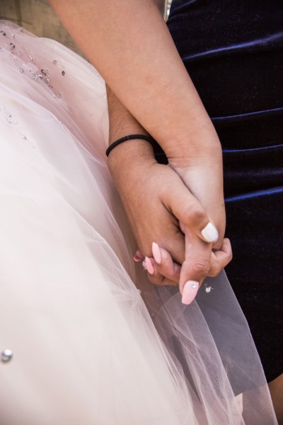 Hispanic girls holding hands