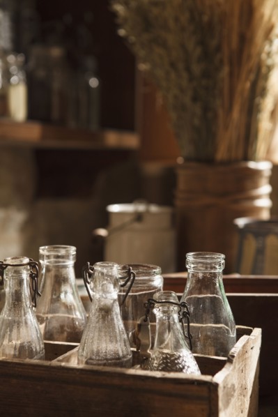 Vintage glass bottles in wooden crates