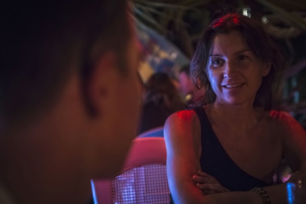 Caucasian couple talking in restaurant