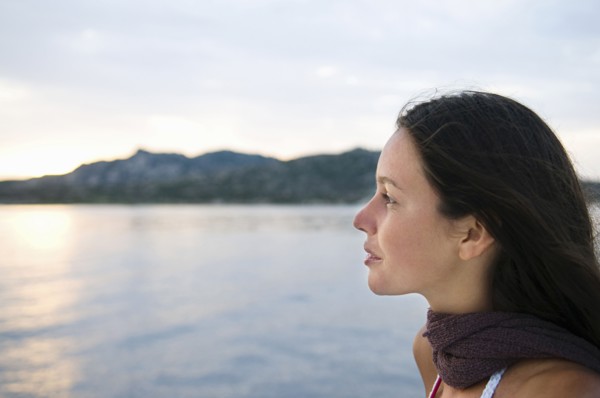 Close up of woman overlooking ocean