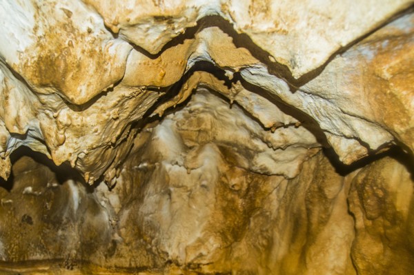 Stalactites on cave ceiling