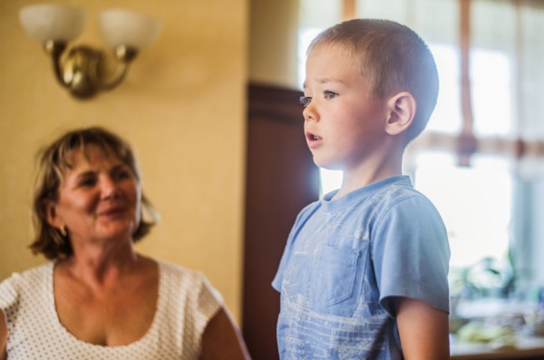 Caucasian mother and son indoors
