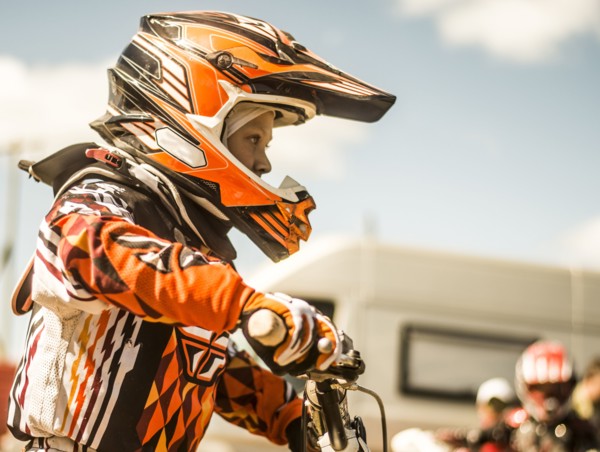 Caucasian motocross biker ready for race