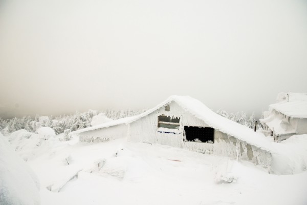 Weather station on snowy remote mountain