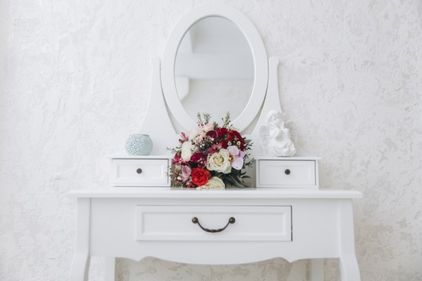 Bouquet of flowers on white vanity