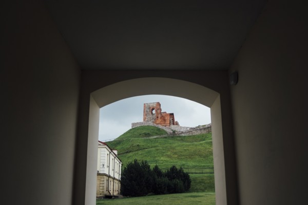 Scenic view of hill from arch