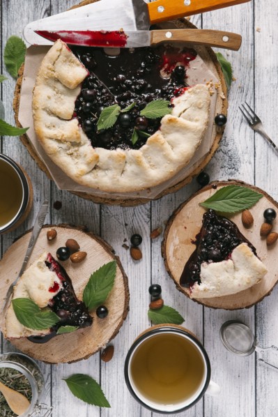 Blueberry pie on wooden table