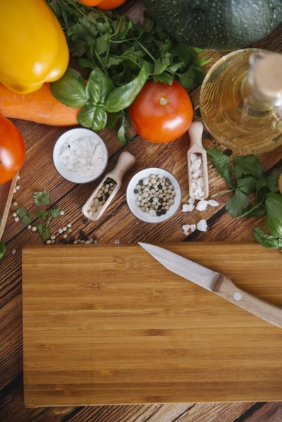 Ingredients for salad near cutting board