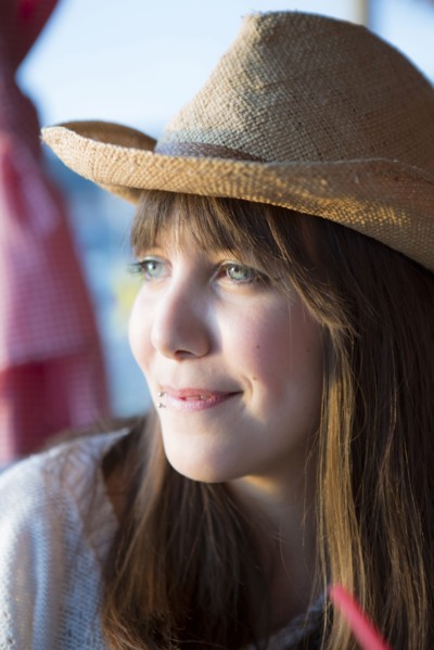 Woman wearing straw hat outdoors