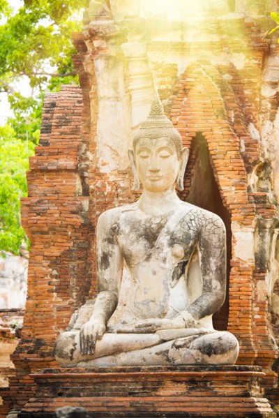 Sunbeams on Buddha statue