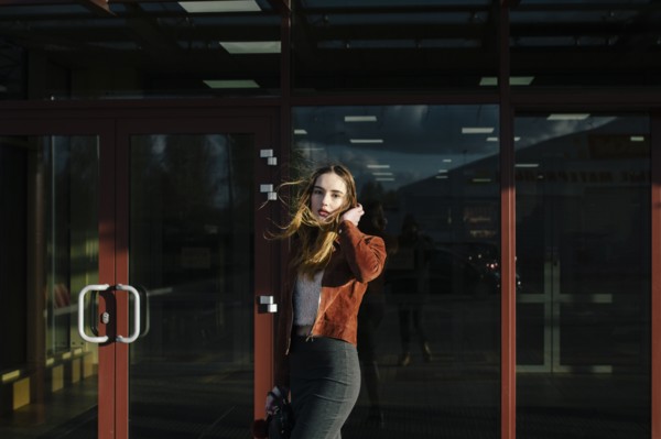 Wind blowing hair of Caucasian woman