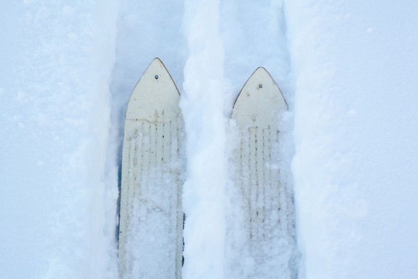 High angle view of skis making tracks in snow