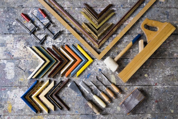 Picture frame tools on splattered table