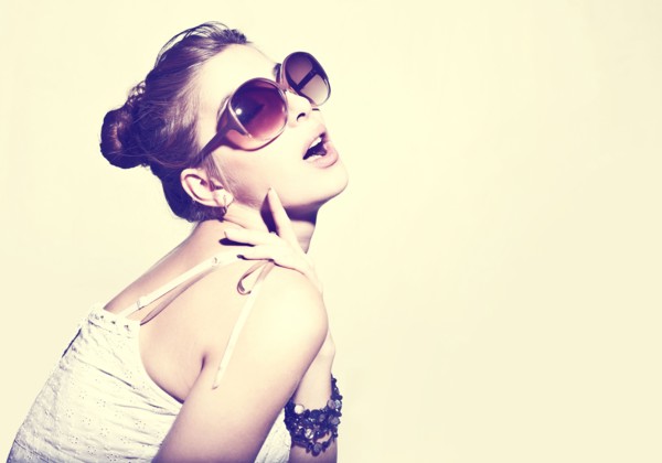 Portrait of glamorous woman wearing sunglasses