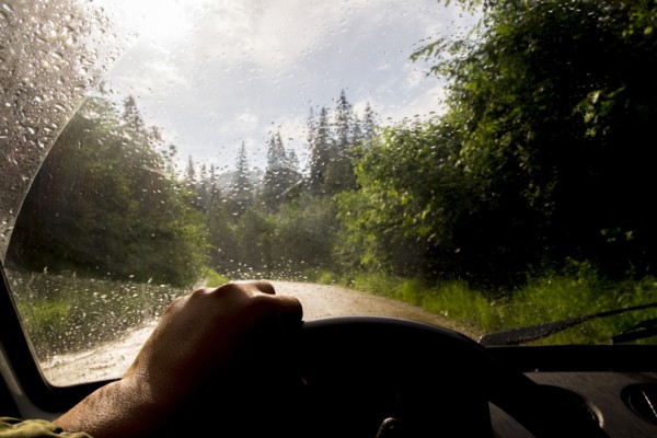 Windshield of car driving in rain