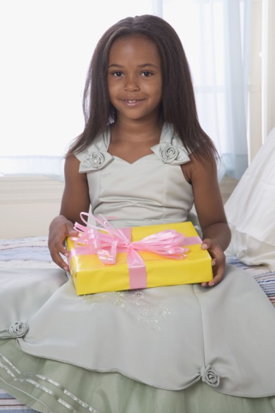 African American girl holding gift