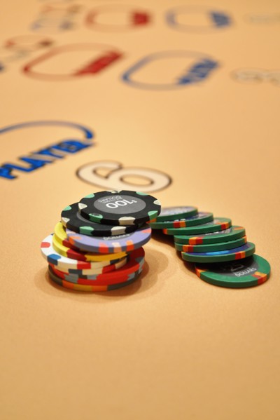 Gambling chips at baccarat table