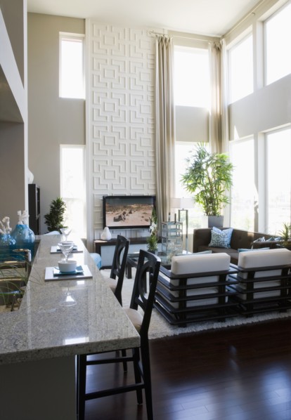 Contemporary loft interior with breakfast bar and living room