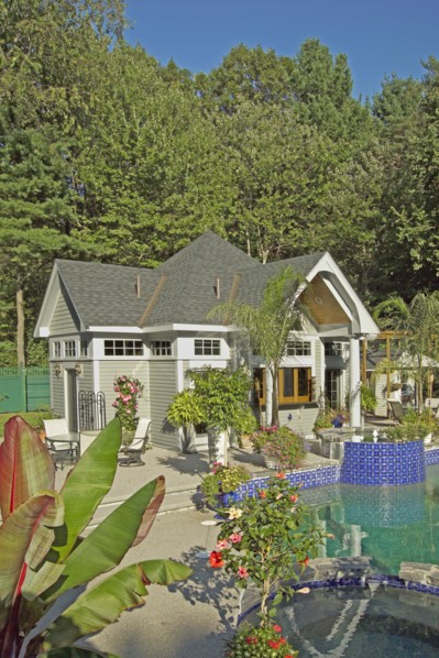 Swimming pool in front of pool house