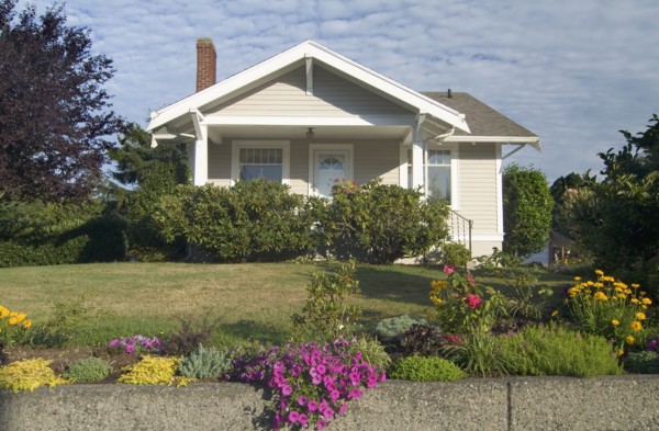 Exterior one story brown house with white trim at Bellingham