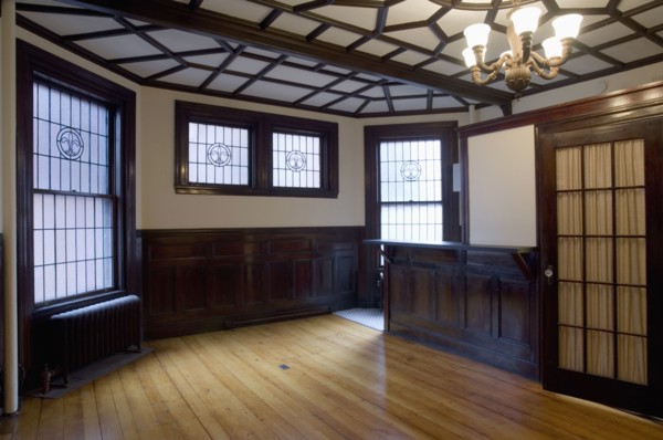 Empty room in apartment with hardwood floor
