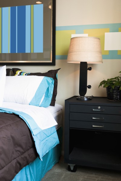 Skateboard lamp on nightstand in boy's room