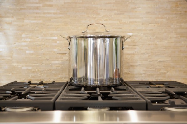 Close-up of a utensil on stove in kitchen at home
