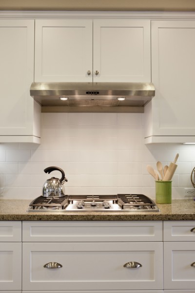 Close-up of a kettle on stove in the kitchen at home