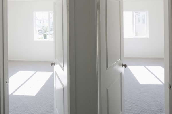 House with empty rooms and open doors