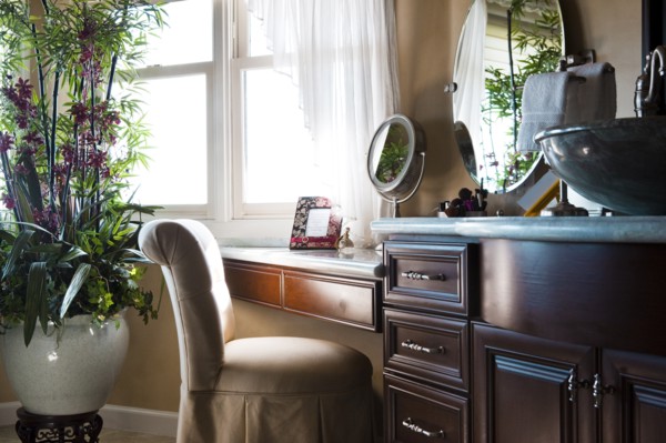 Chair at dressing table in bathroom at home