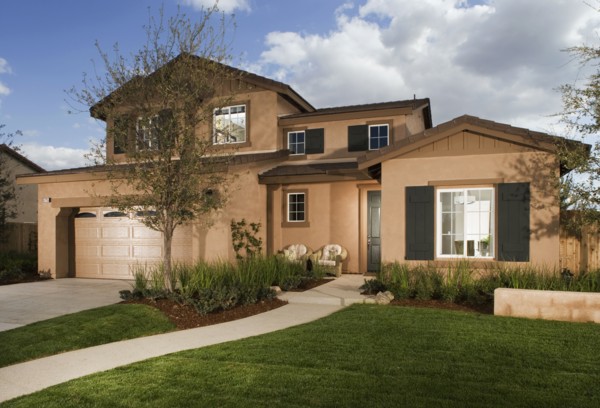 Walkway leading to front entrance of traditional home