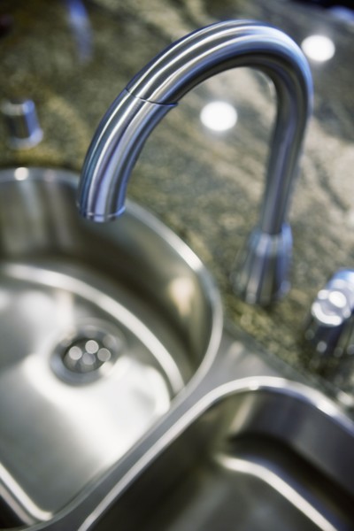 Gooseneck faucet above kitchen sink