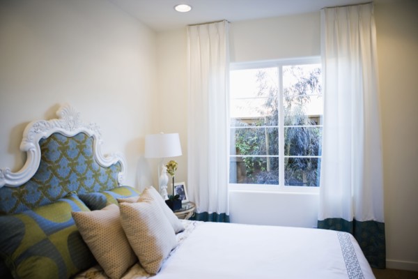Decorative headboard in contemporary bedroom