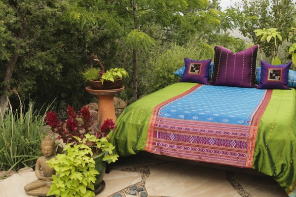 Colorful bedding on outdoor bed