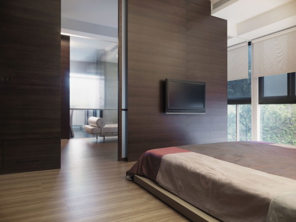 Simple modern bedroom with flat screen television