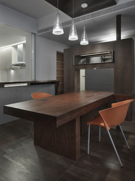 View through cut out of modern dining table