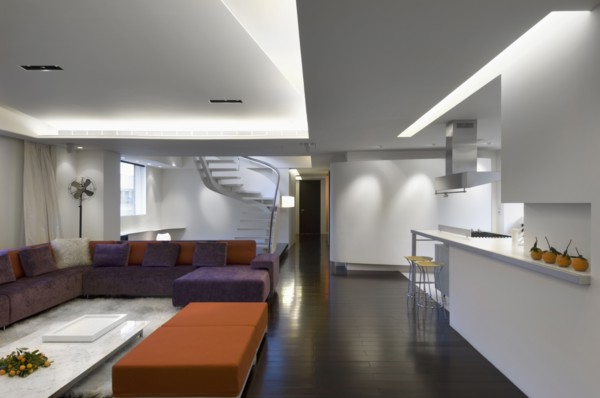 Modern interior with orange and purple furnishings