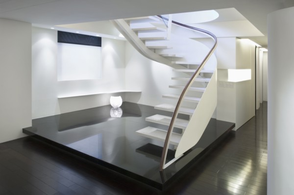 Modern white staircase with glass banister