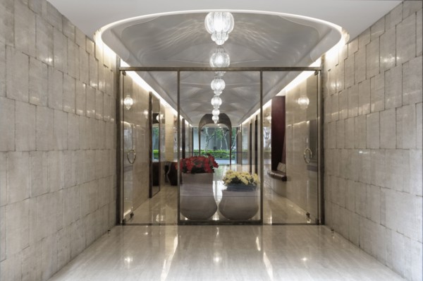 Detail double glass doors with large flower pots