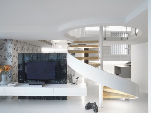 Modern winding staircase and television