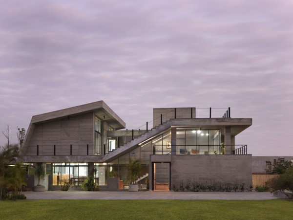 Front exterior modern home at sunset