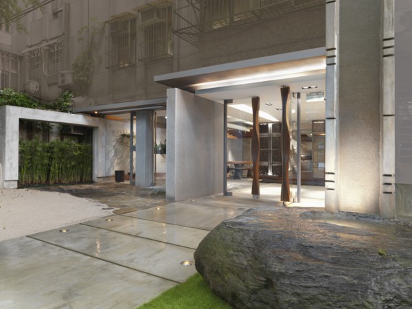 Modern fountain outside entrance to home