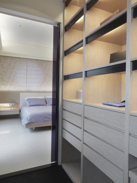 View from walk in closet to master bedroom