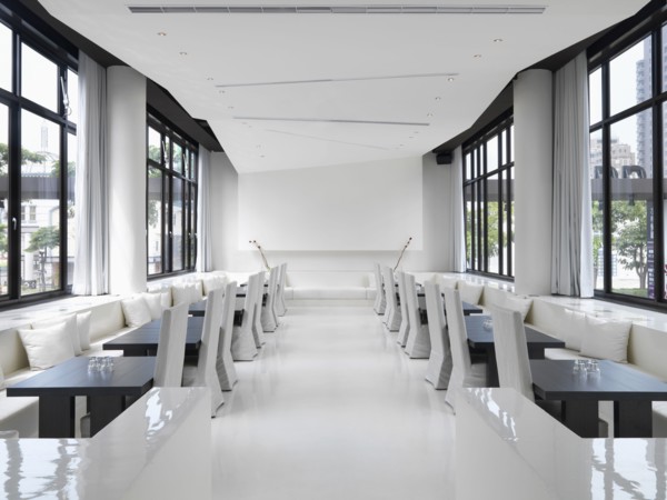Long narrow white modern dining room