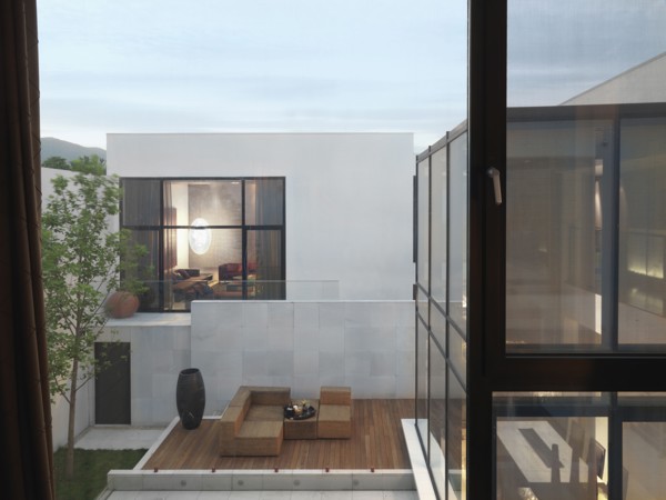 View of exterior of modern home and deck